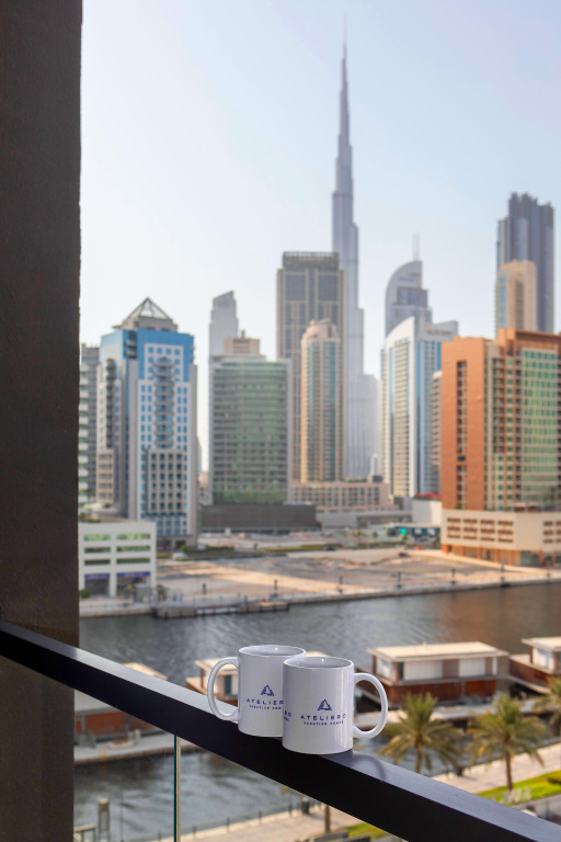 Дубай: Апартаменты Premium 1BR with Canal & Burj Khalifa view