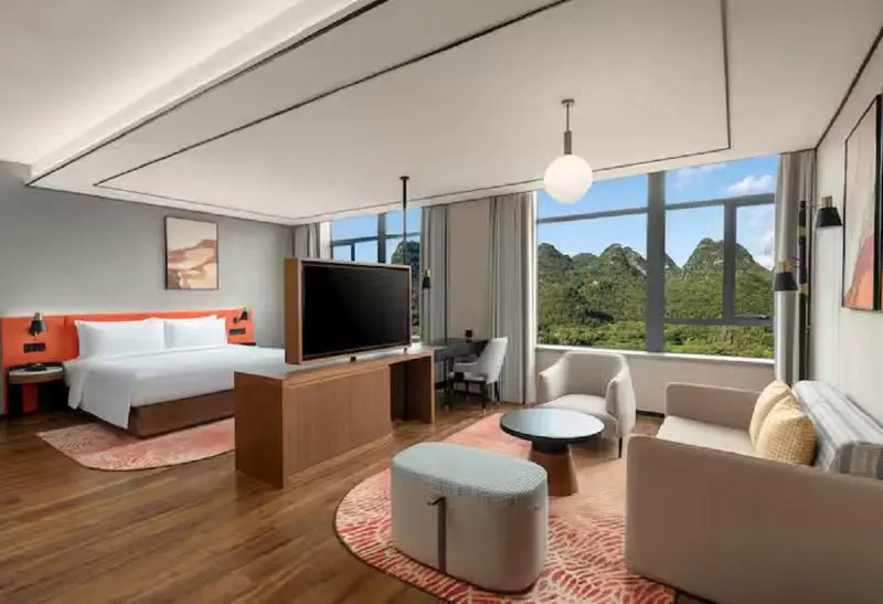 Синъи: Hilton Garden Inn Xingyi Wanfenglin