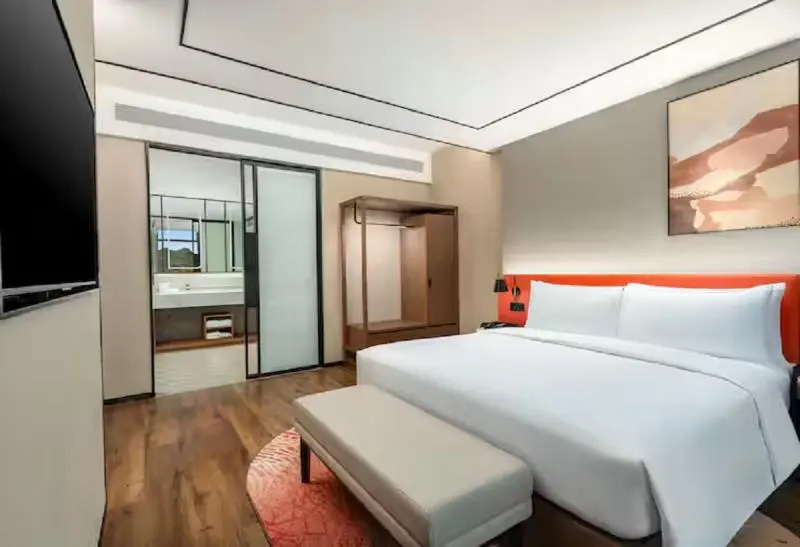 Синъи: Hilton Garden Inn Xingyi Wanfenglin