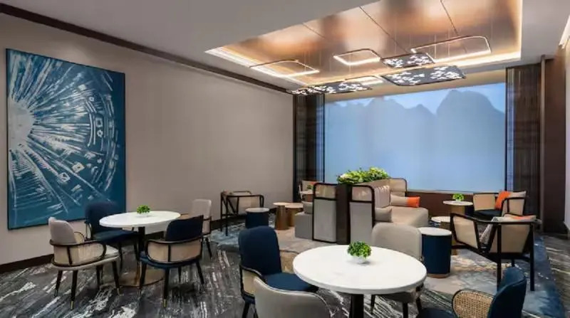 Синъи: Hilton Garden Inn Xingyi Wanfenglin