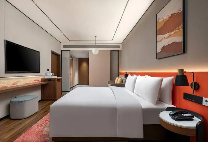 Синъи: Hilton Garden Inn Xingyi Wanfenglin