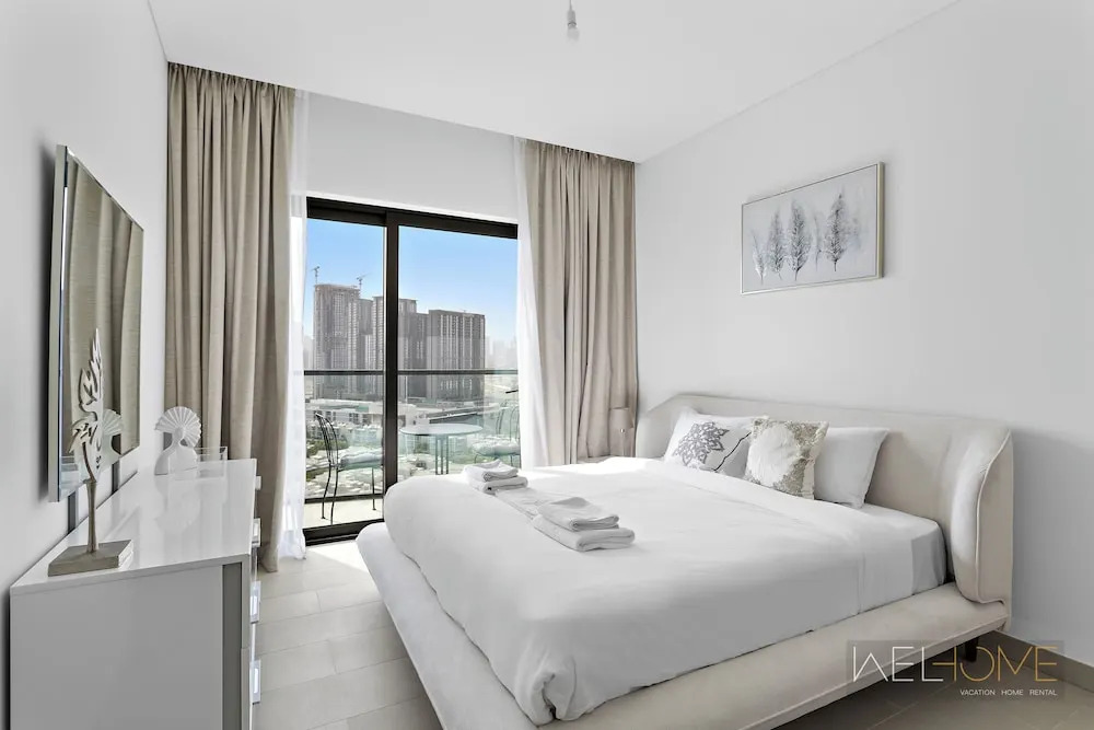 Дубай: WelHome - Charming Apt With City Lights in Sobha Waves