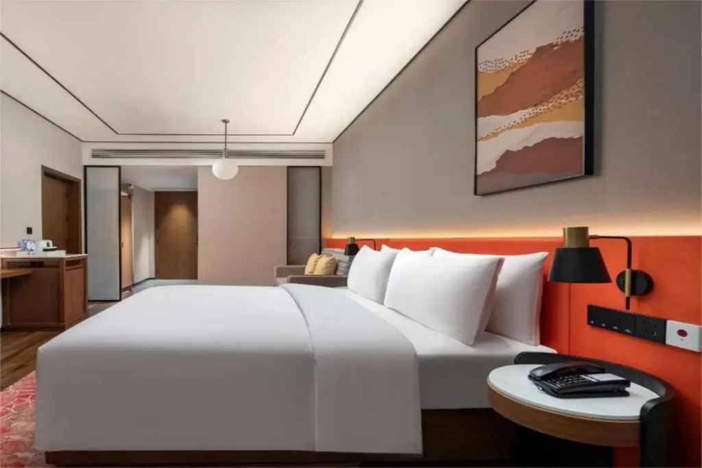 Синъи: Hilton Garden Inn Xingyi Wanfenglin
