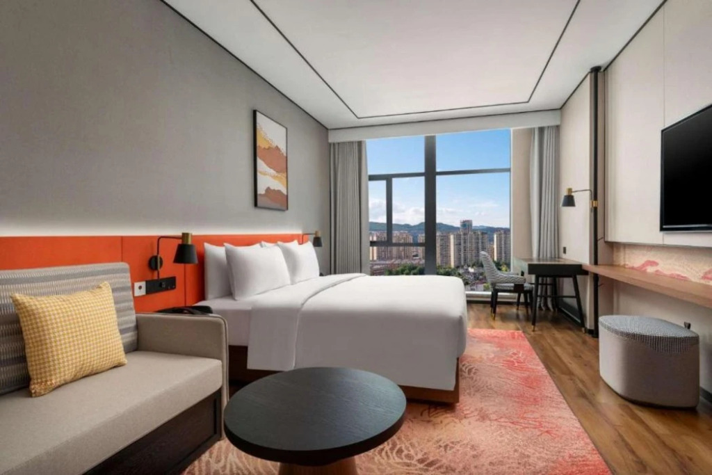 Синъи: Hilton Garden Inn Xingyi Wanfenglin