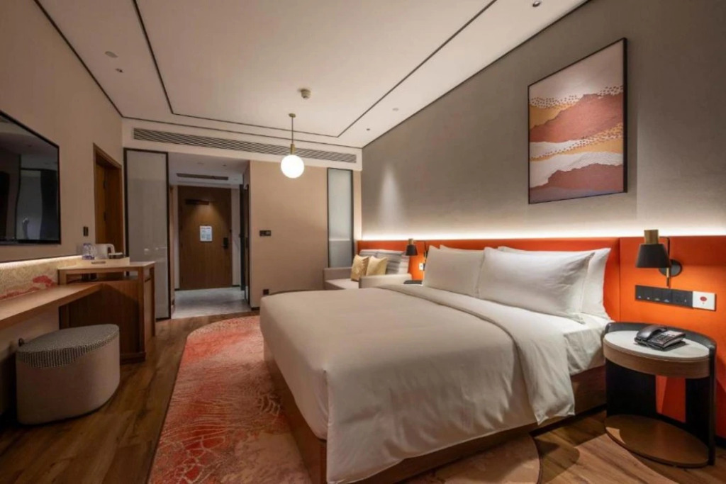 Синъи: Hilton Garden Inn Xingyi Wanfenglin