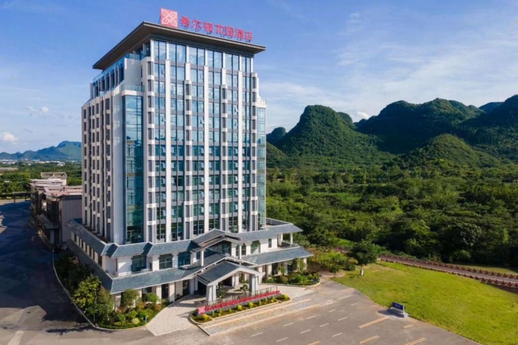 Синъи: Hilton Garden Inn Xingyi Wanfenglin