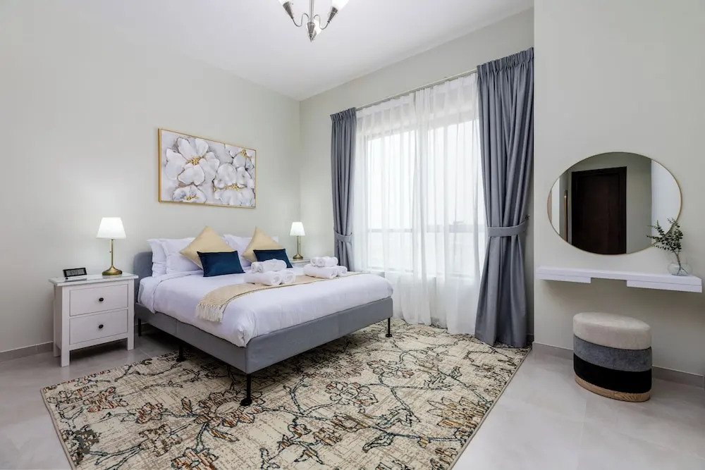 Дубай: Waves - Stylish 1BR Close to IMG World & Global Village