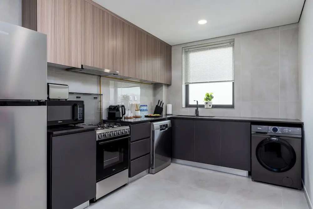 Дубай: Waves - Stylish 1BR Close to IMG World & Global Village