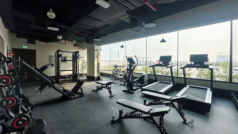 Дубай: Waves - Stylish 1BR Close to IMG World & Global Village