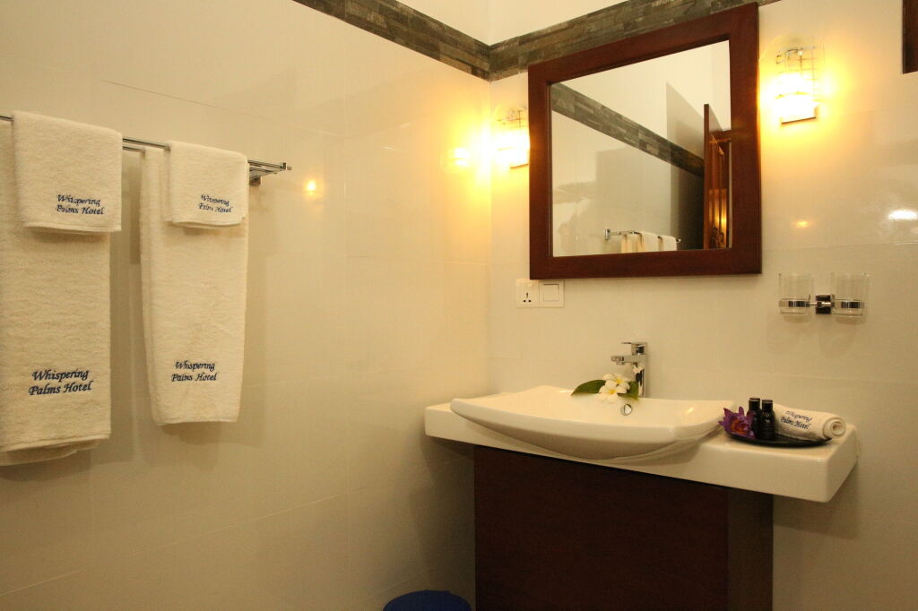 Whispering Palms Hotel — фото 4