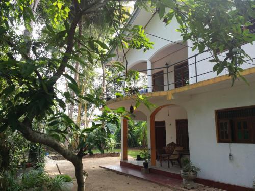 Хиккадува: Pathum Guest House