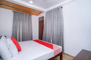 Мирисса: OYO 390 Surf Sea Breeze - Land Side