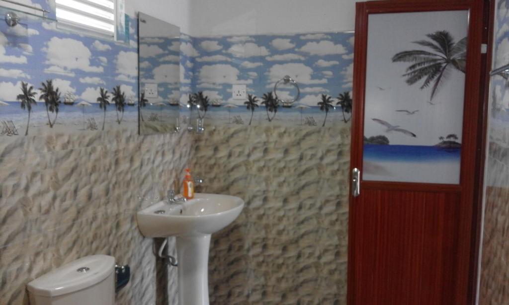 Таларамба: Coco One Holiday Inn