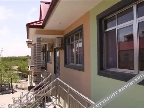 Циньхуандао: Yijia Guesthouse Beidaihe