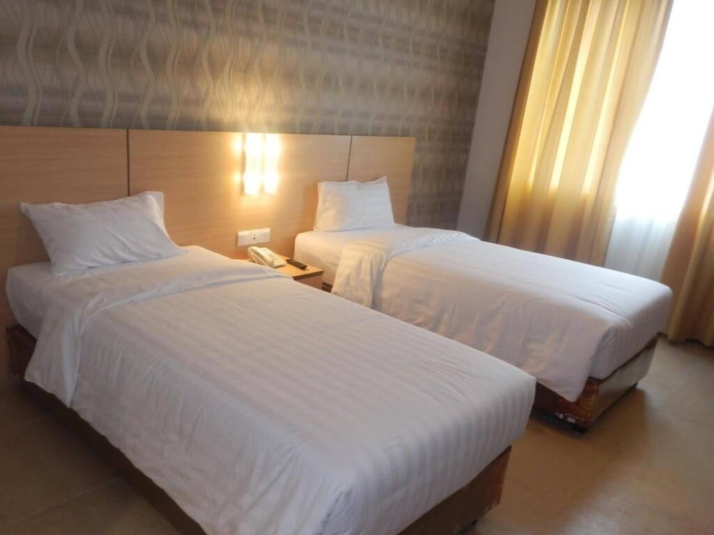 Медан: Grand Impression Hotel Medan