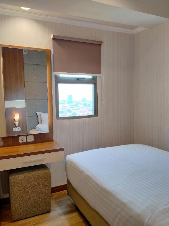 Сурабая: Apartemen Puncak Marina
