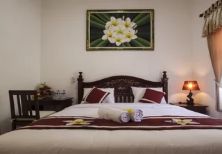 Беноа: Frangipani Homestay