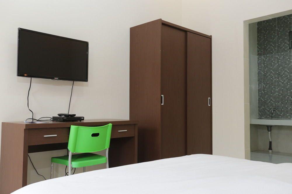 Кута: RedDoorz @ Mahendradatta Selatan
