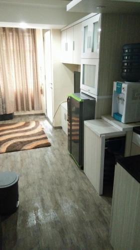 Бандунг: Jarrdin Apartment by Rumahku