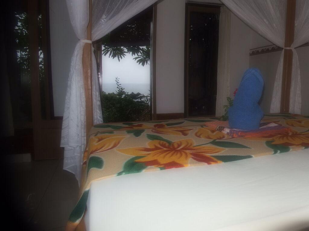 Бунутан: Titi Sedana Homestay
