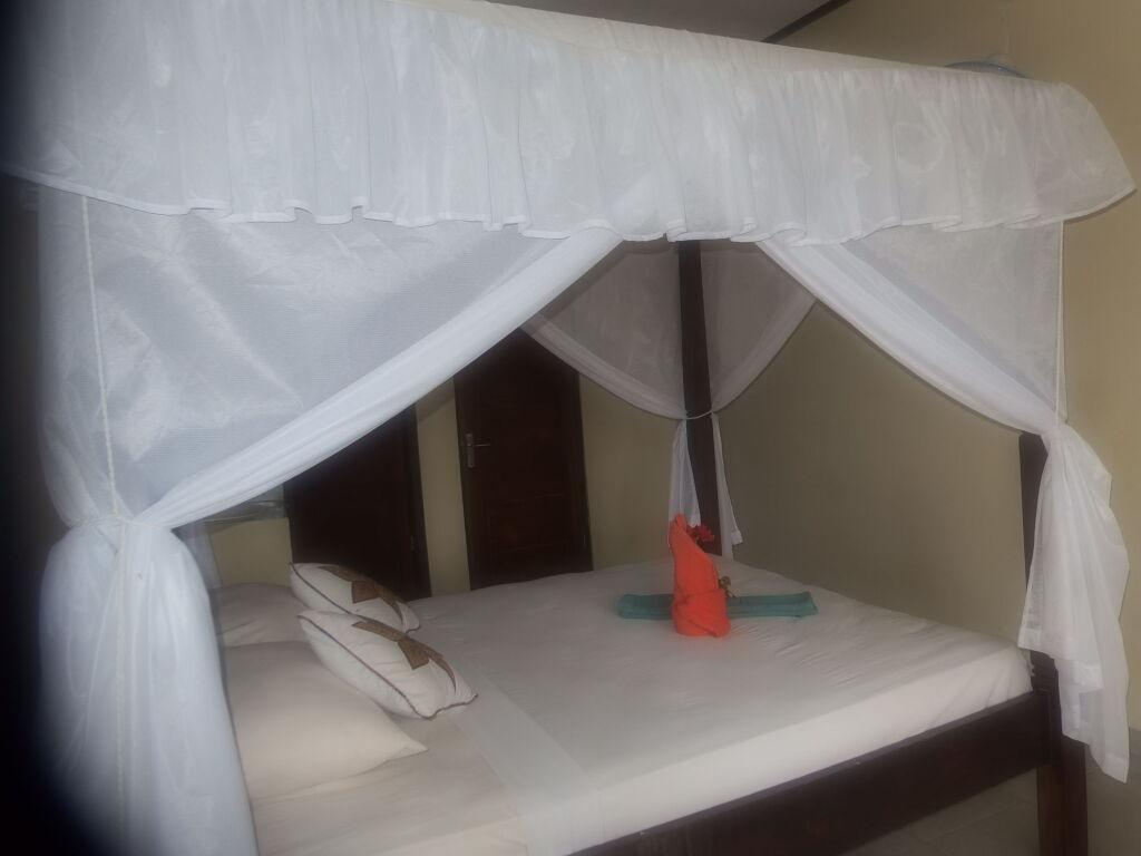 Бунутан: Titi Sedana Homestay