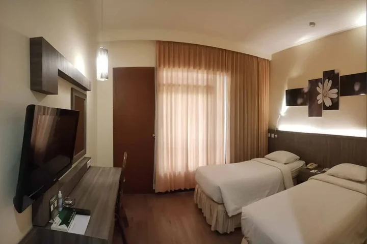 Бату: Purnama Hotel