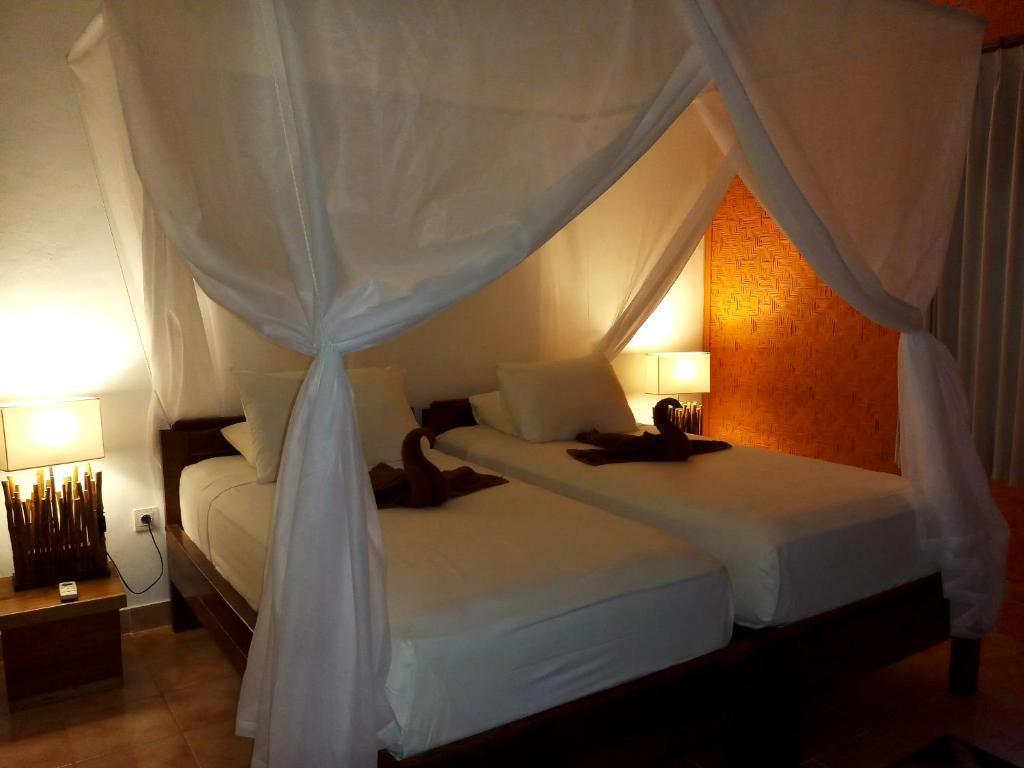 Бунутан: Vienna Beach Resort