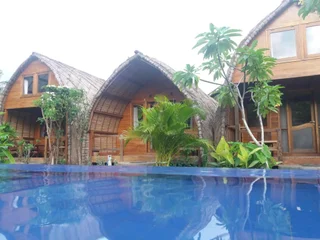 Гили Траванган: Cotton Tree Cottages