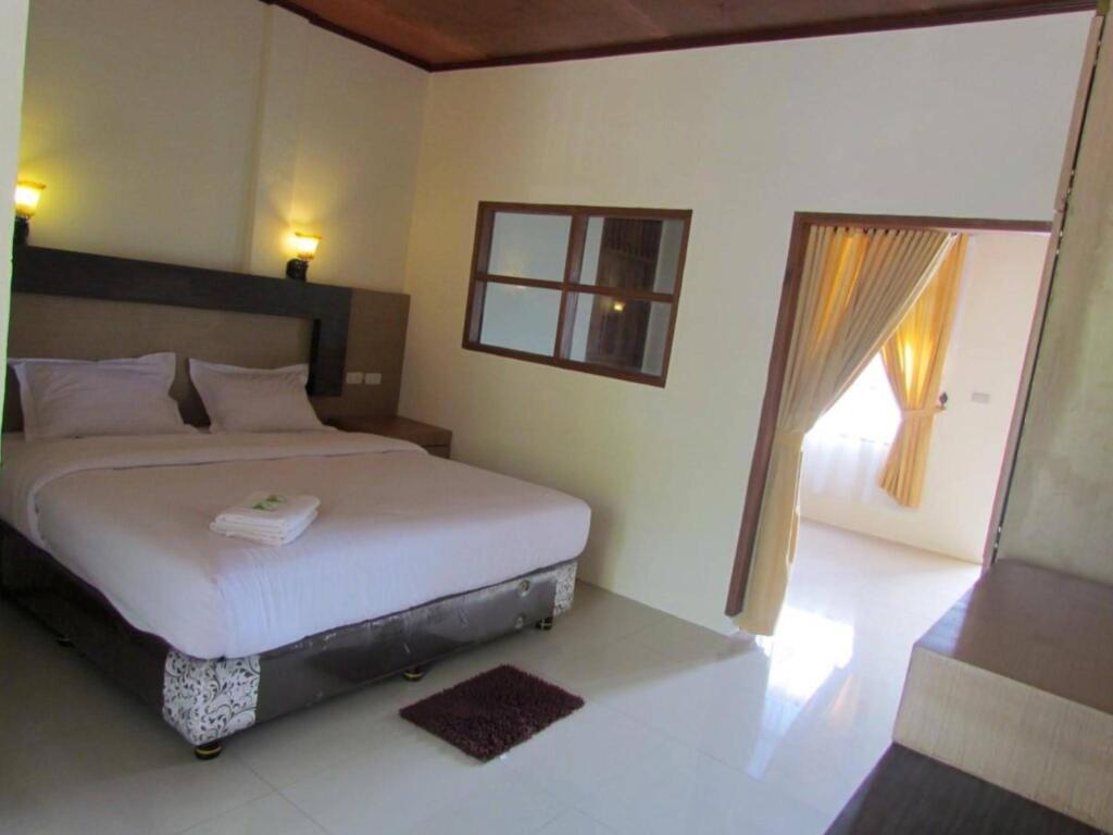 Маланг: De Corner Suite Guesthouse