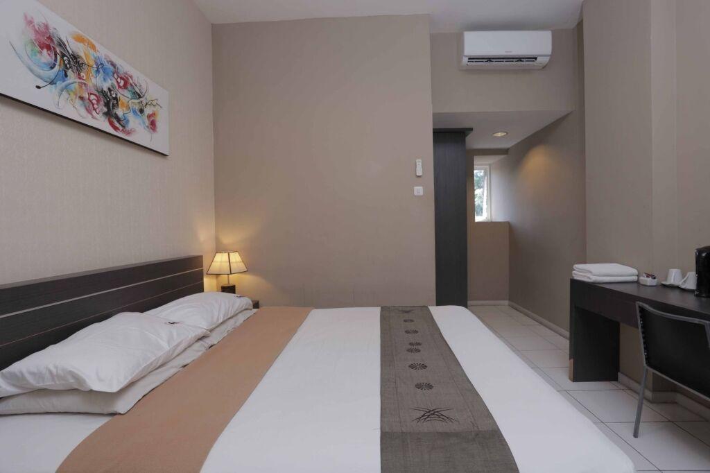 Кута: RedDoorz @ Sunset Point Seminyak
