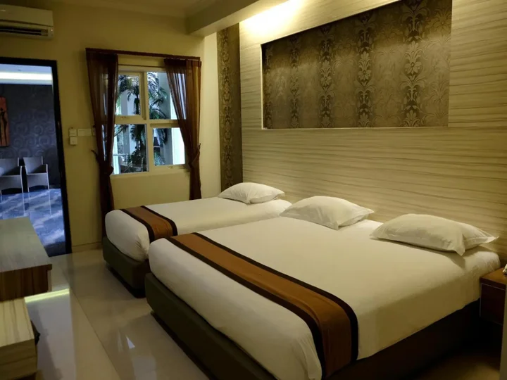 Маланг: De'Corner Guest House