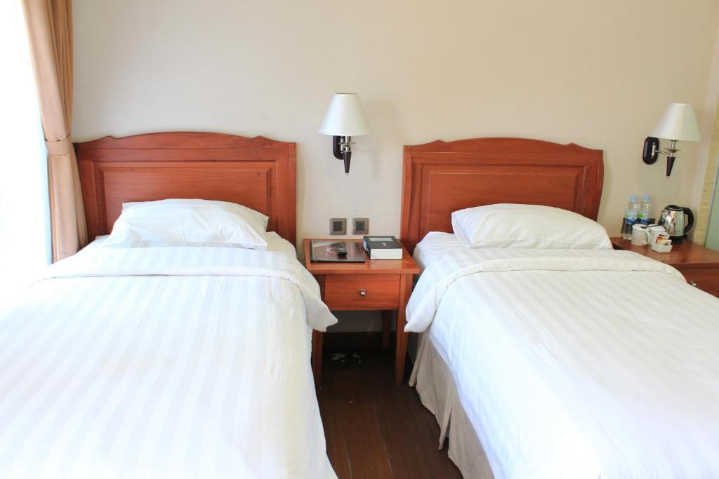 Петумбак: Thong's Inn - KNO Kualanamu Transit Hotel