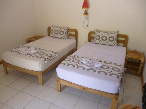 Кута: Dewi Garden Guesthouse