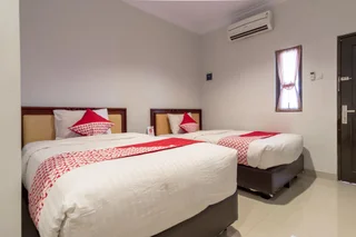 Медан: Super OYO 283 Helvetia Residence
