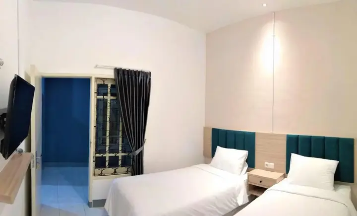 Сурабая: Kokonut Guesthouse