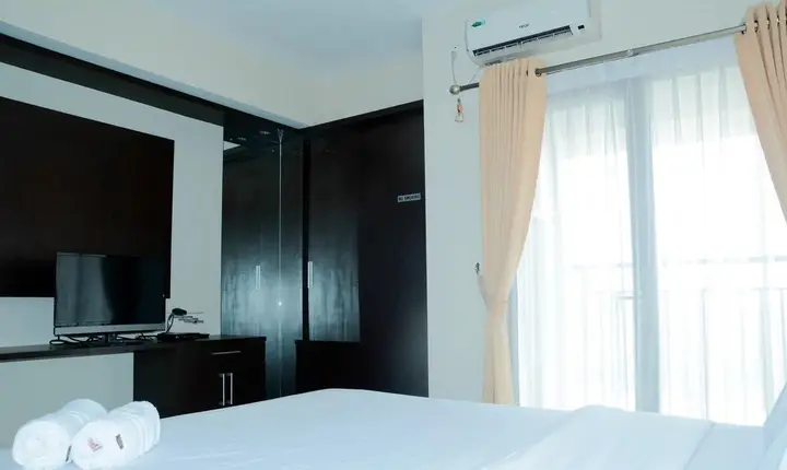 Simply Studio Room Atria Residence Apartment near Summarecon Mall By Travelio — фото 2