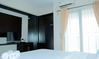 Legok: Simply Studio Room Atria Residence Apartment near Summarecon Mall By Travelio