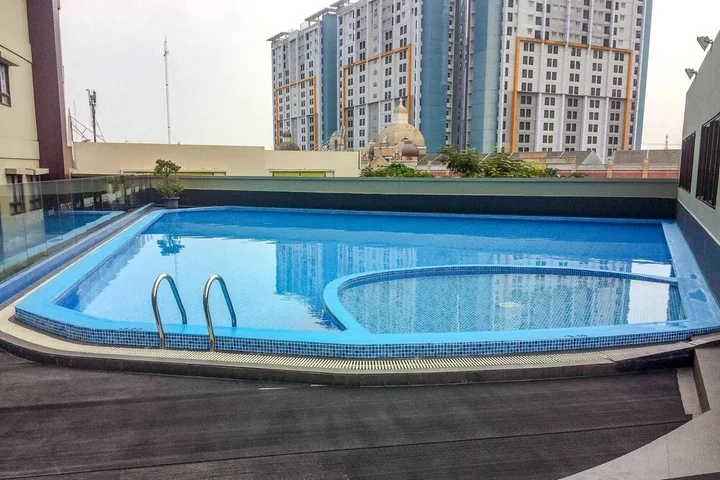 Legok: Simply Studio Room Atria Residence Apartment near Summarecon Mall By Travelio