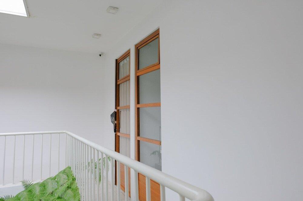 Маланг: OYO 626 Augustina Home