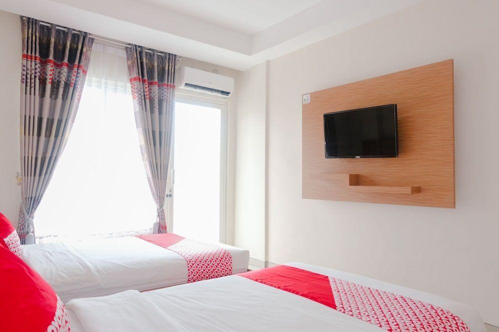 Маланг: Oyo 696 Hasanah Guest House Syariah de Saphire