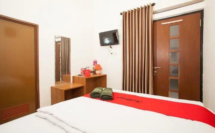 RedDoorz Syariah near Singha Merjosari Park — фото 4
