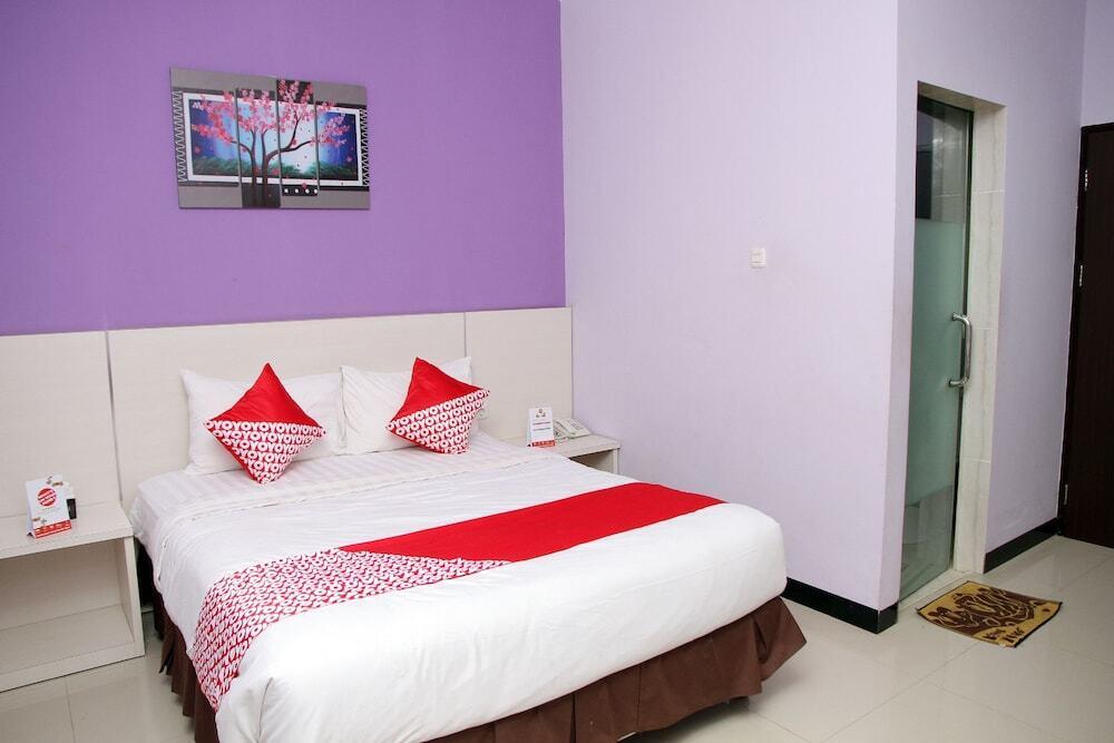 Палу: OYO 1138 Purple Hotel