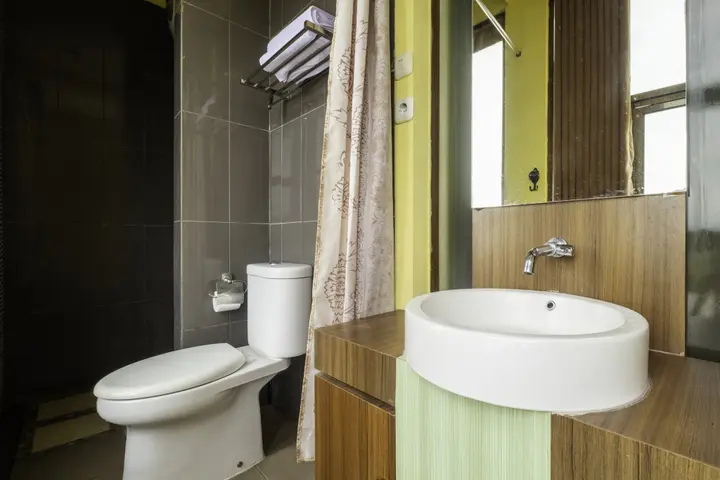 Пелабухан-рату: Capital O 1973 Guest House Toserba Selamat Syariah Pelabuhan Ratu