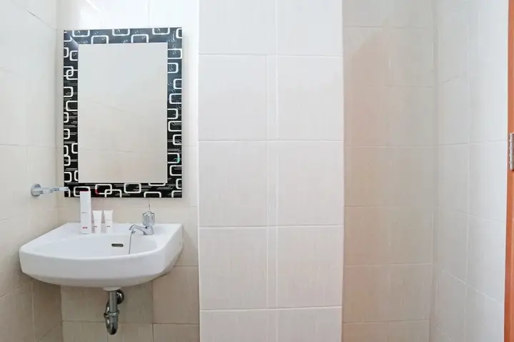 Паданг: OYO 1673 M Authentic Kost Man