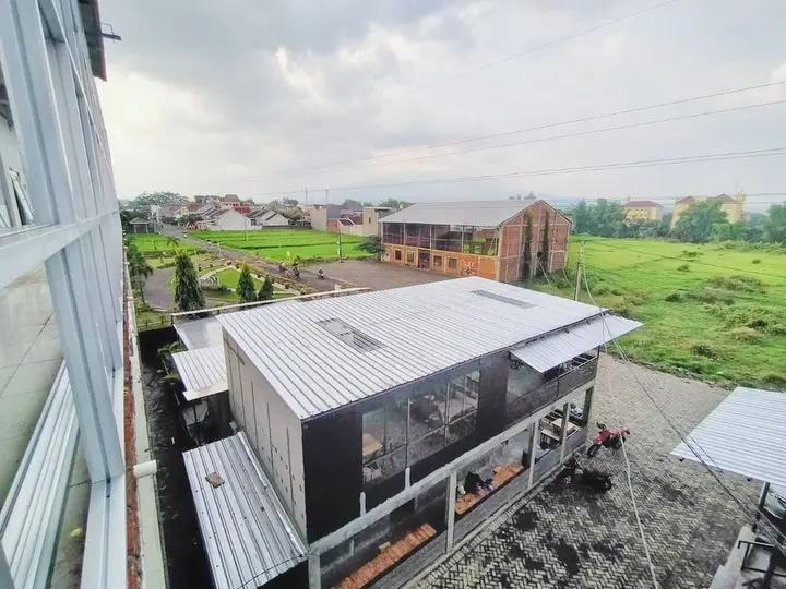 Маланг: OYO 1468 SM House