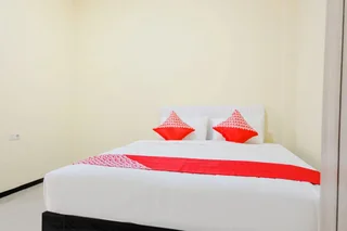 Маланг: OYO 1468 SM House