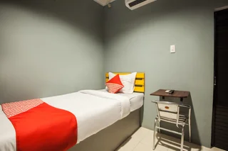 Медан: OYO 990 Stadion Residence Syariah