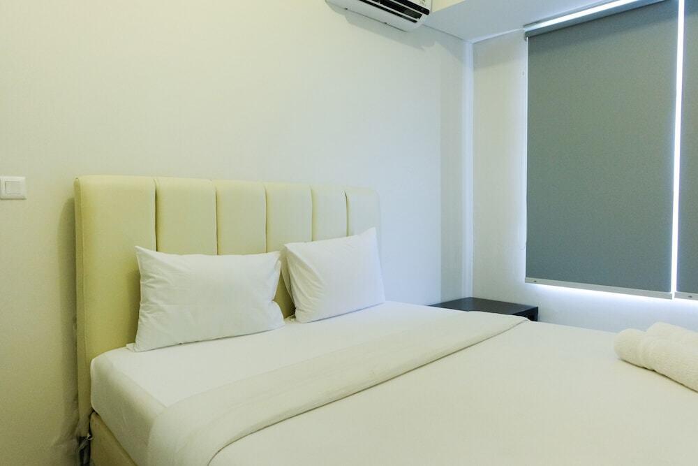 Elegant and Comfy 1BR Saveria Apartment near ICE BSD By Travelio — фото 2