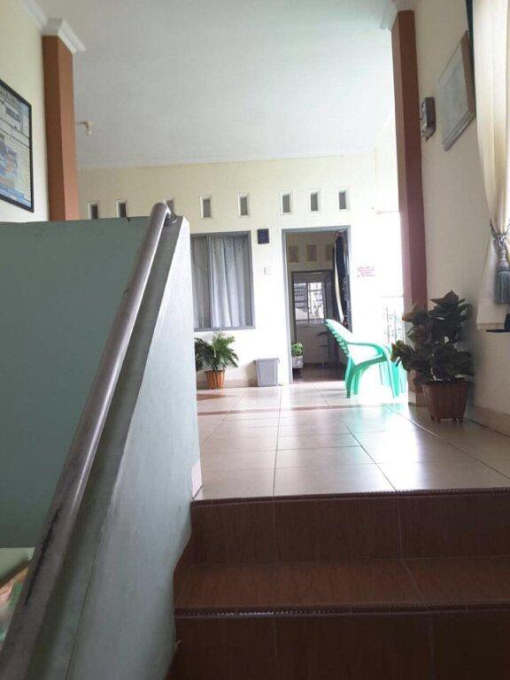 Пеканбару: Penginapan Syariah