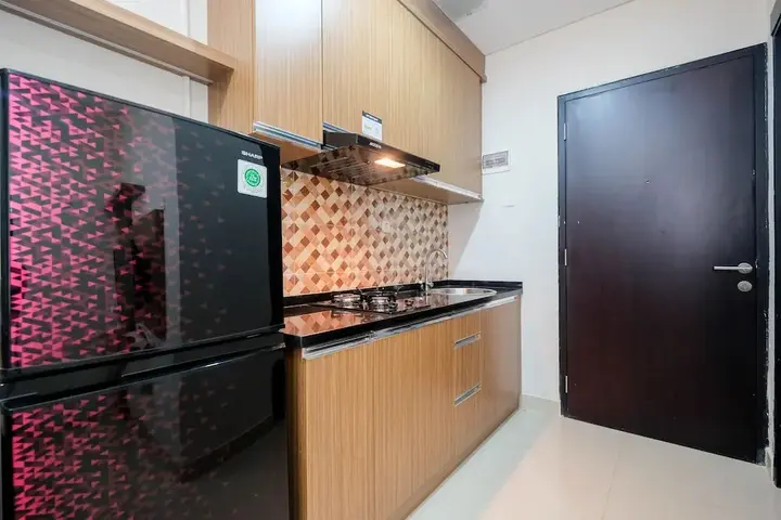 Депок: Warm and Homey 1BR Apartment at Atlanta Residences By Travelio
